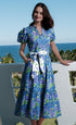 Navy Litchfield Dress by Dizzy-Lizzie featuring a ground hydrangea floral print and flowing silhouette.