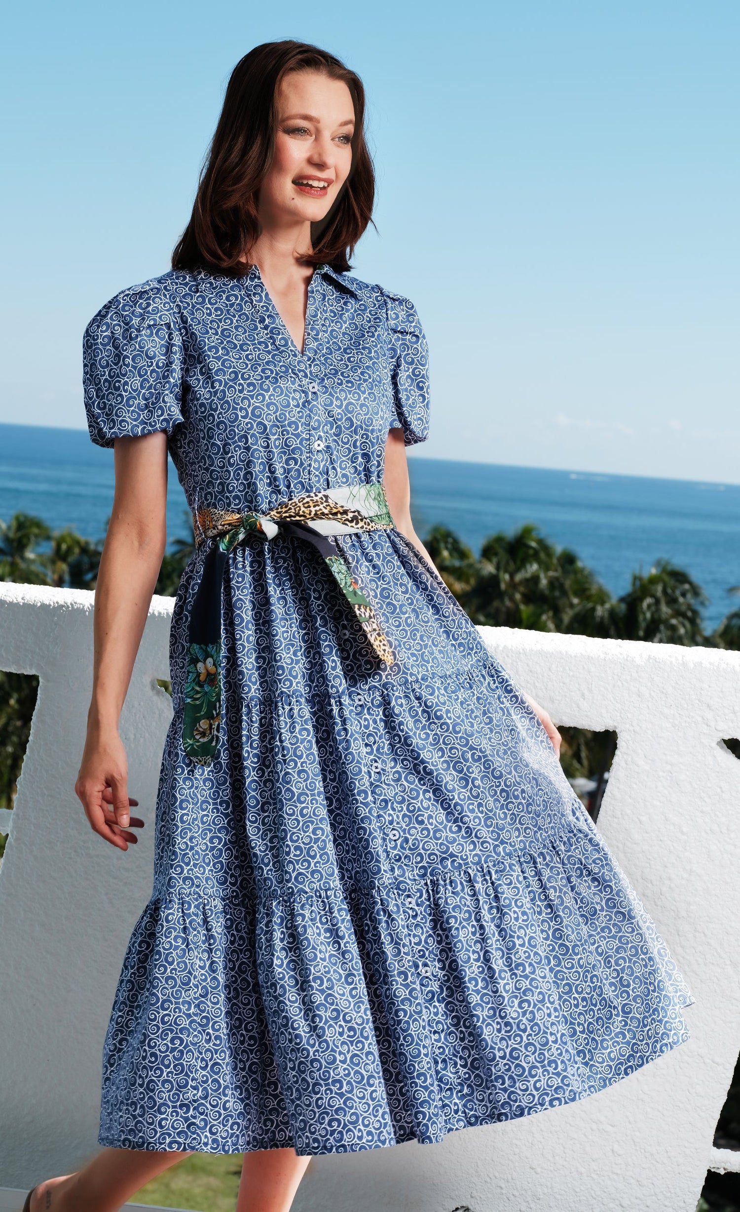 Litchfield navy and white swirl print dress by Dizzy-Lizzie, with a flowy silhouette and sleeveless design.