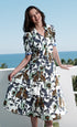 Dizzy-Lizzie Montauk dress with cheetah and floral linen cotton fabric, showcasing a stylish, lightweight summer dress design.
