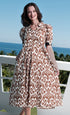 Dizzy-Lizzie Montauk Dress in chocolate ikat print with cotton linen fabric, showcasing a flowy, stylish summer dress.