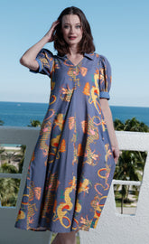 Blue linen and cotton Montauk Dress by Dizzy-Lizzie featuring a vibrant dragons print, perfect for casual summer wear.