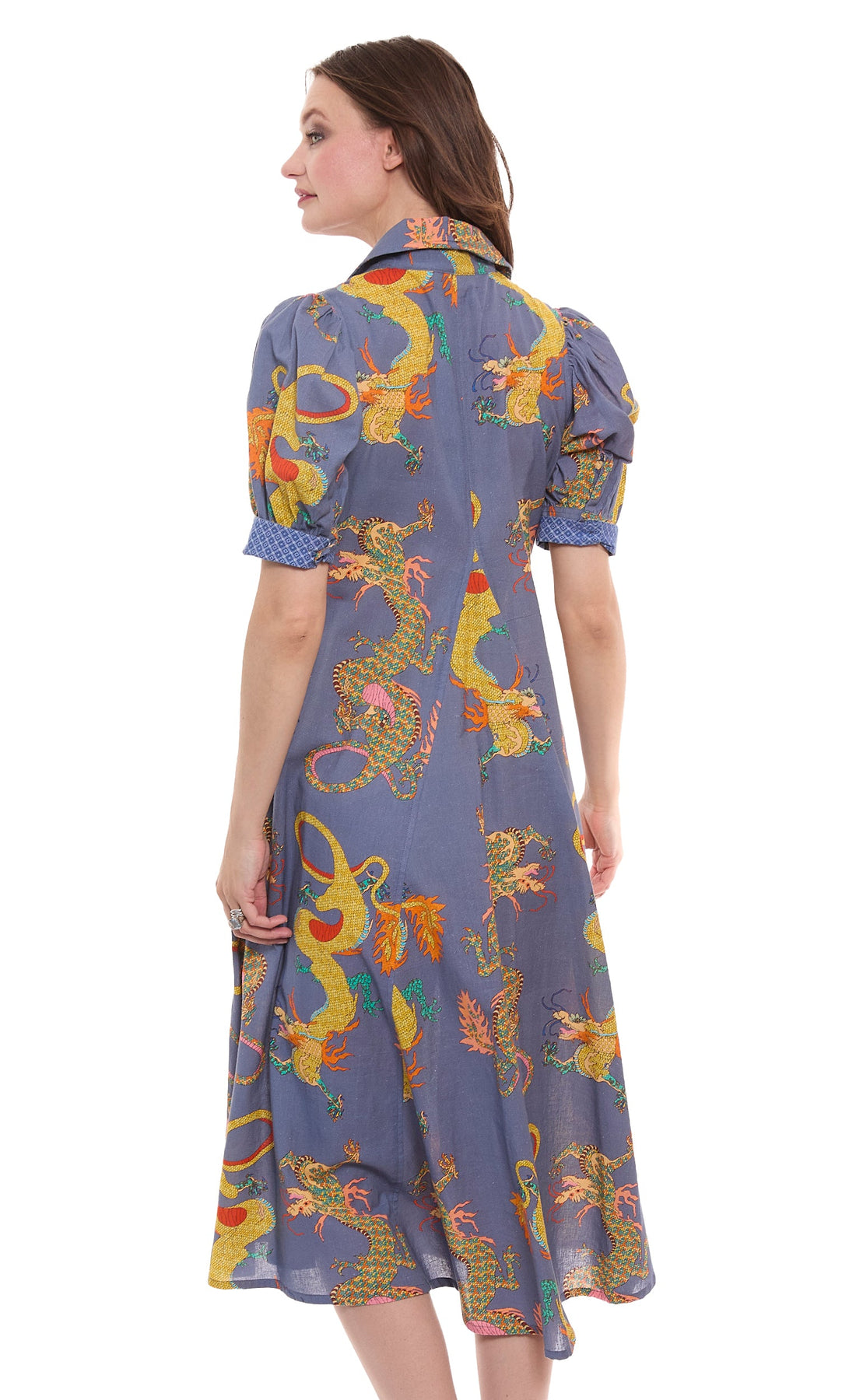 Dizzy-Lizzie Montauk Dress made of linen and cotton with a blue dragons print, showcasing a lightweight, stylish summer dress.