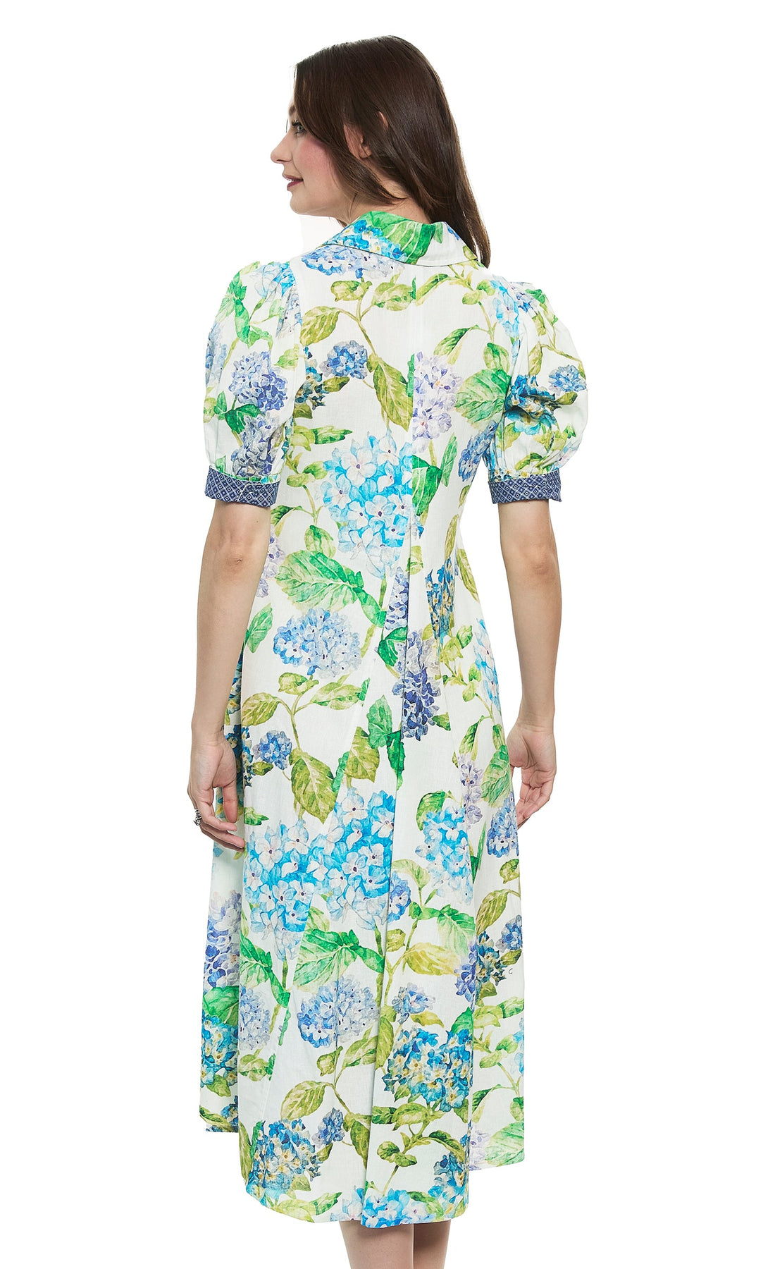 Dizzy-Lizzie Montauk Dress in linen and cotton with a hydrangeas print, displayed on a hanger against a neutral background.