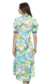 Dizzy-Lizzie Montauk Dress in linen and cotton with a hydrangeas print, displayed on a hanger against a neutral background.
