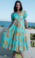 Dizzy-Lizzie Montauk Dress made of linen and cotton with turquoise dragon print, showcasing a bohemian style dress.
