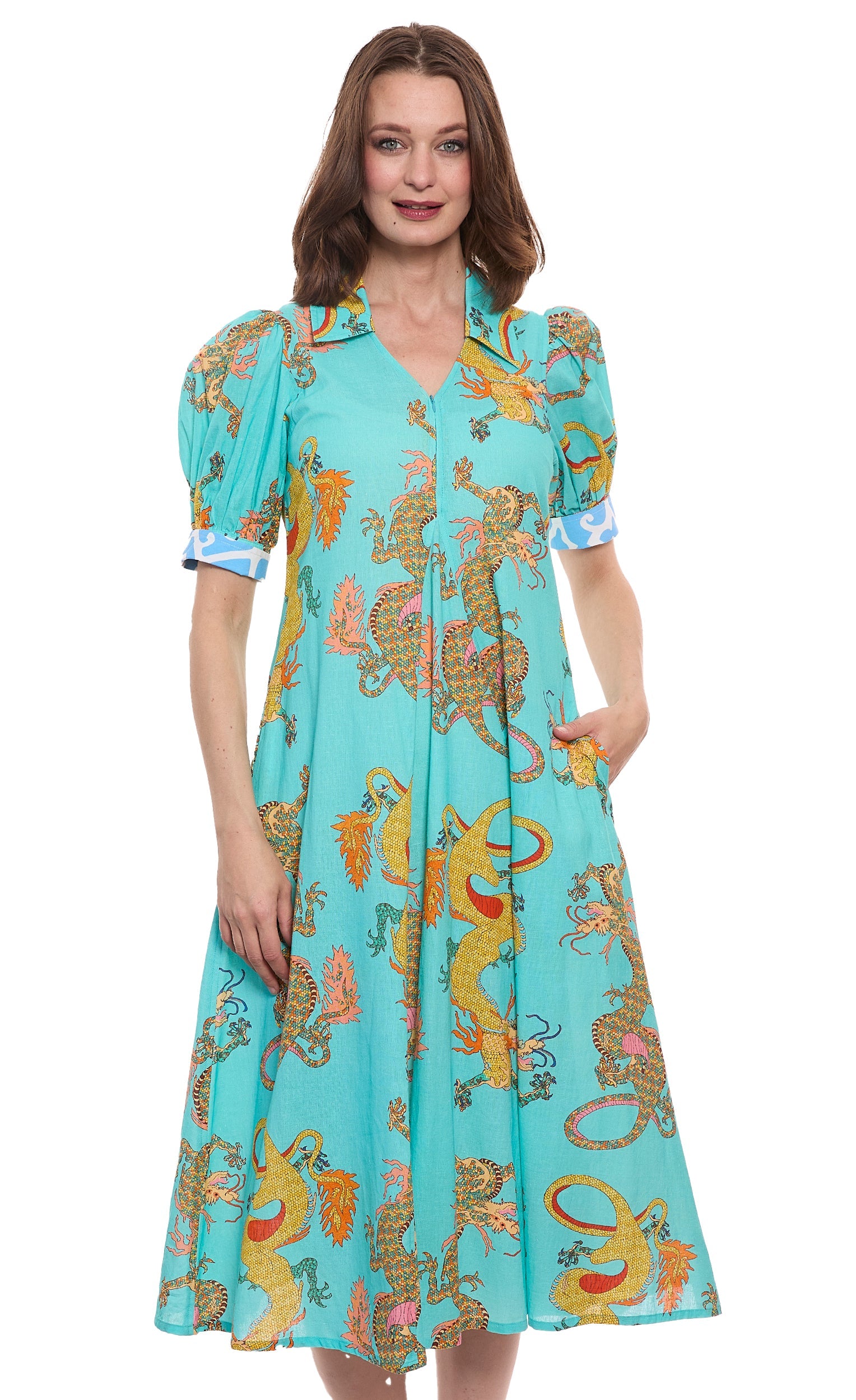 Dizzy-Lizzie Montauk Dress in linen and cotton with turquoise dragon print, featuring a flowing design and sleeveless style.