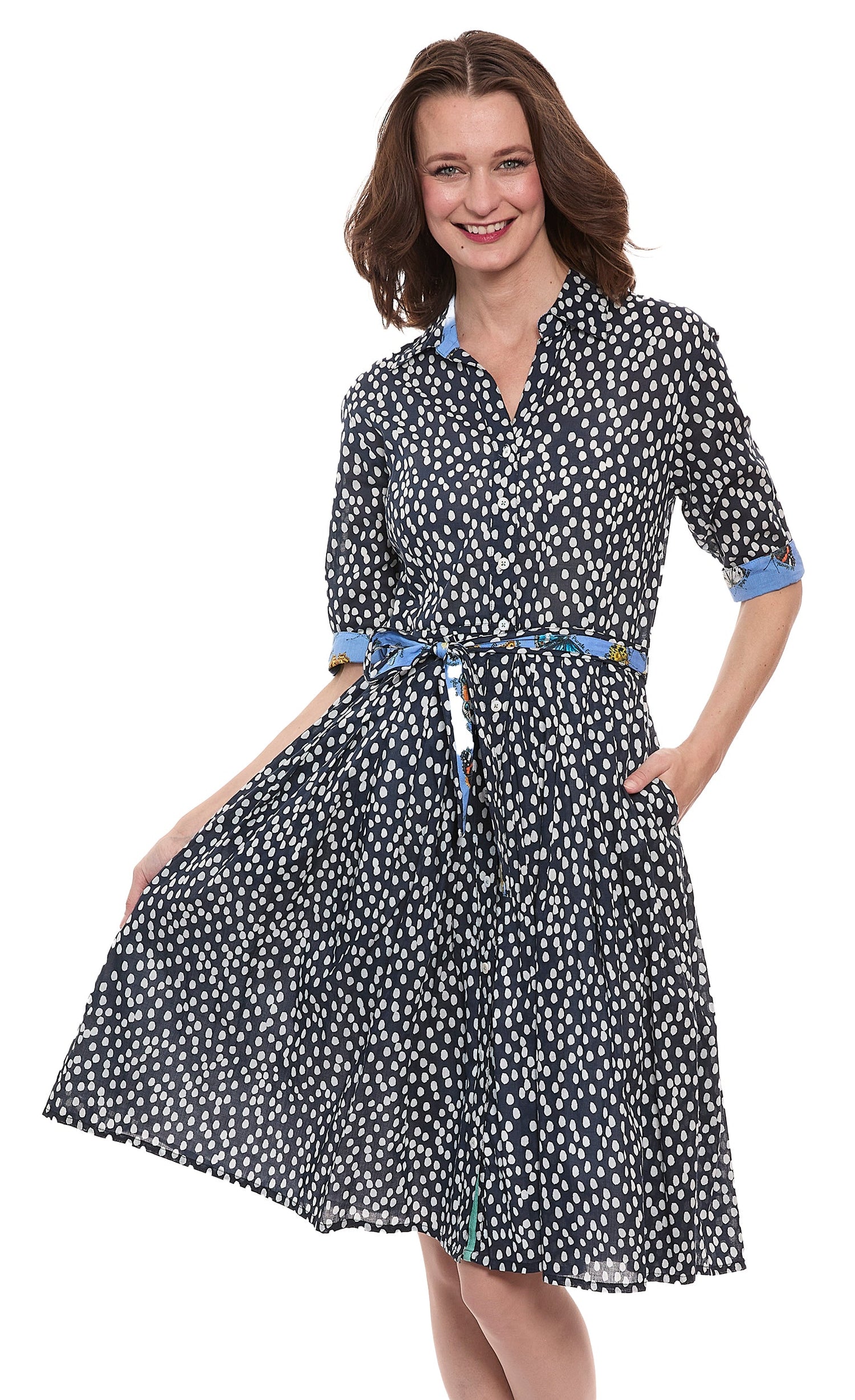 Navy and white polka dot cotton voile dress by Dizzy-Lizzie, featuring a classic Mrs. Maisel-inspired style.