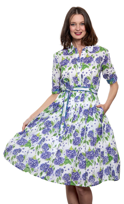Dizzy-Lizzie Mrs Maisel White Ground Hydrangea floral dress with a fitted bodice and flowing skirt, perfect for elegant occasions.