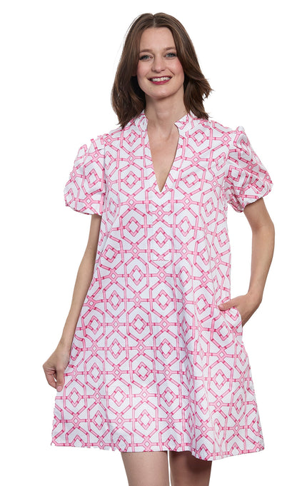 Dizzy-Lizzie Tiburon dress with puff sleeves and straight skirt, featuring a stylish and elegant design.