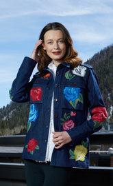 Embroidered denim jacket by Dizzy-Lizzie, featuring detailed embroidery, classic style, and a casual fit in light blue denim.