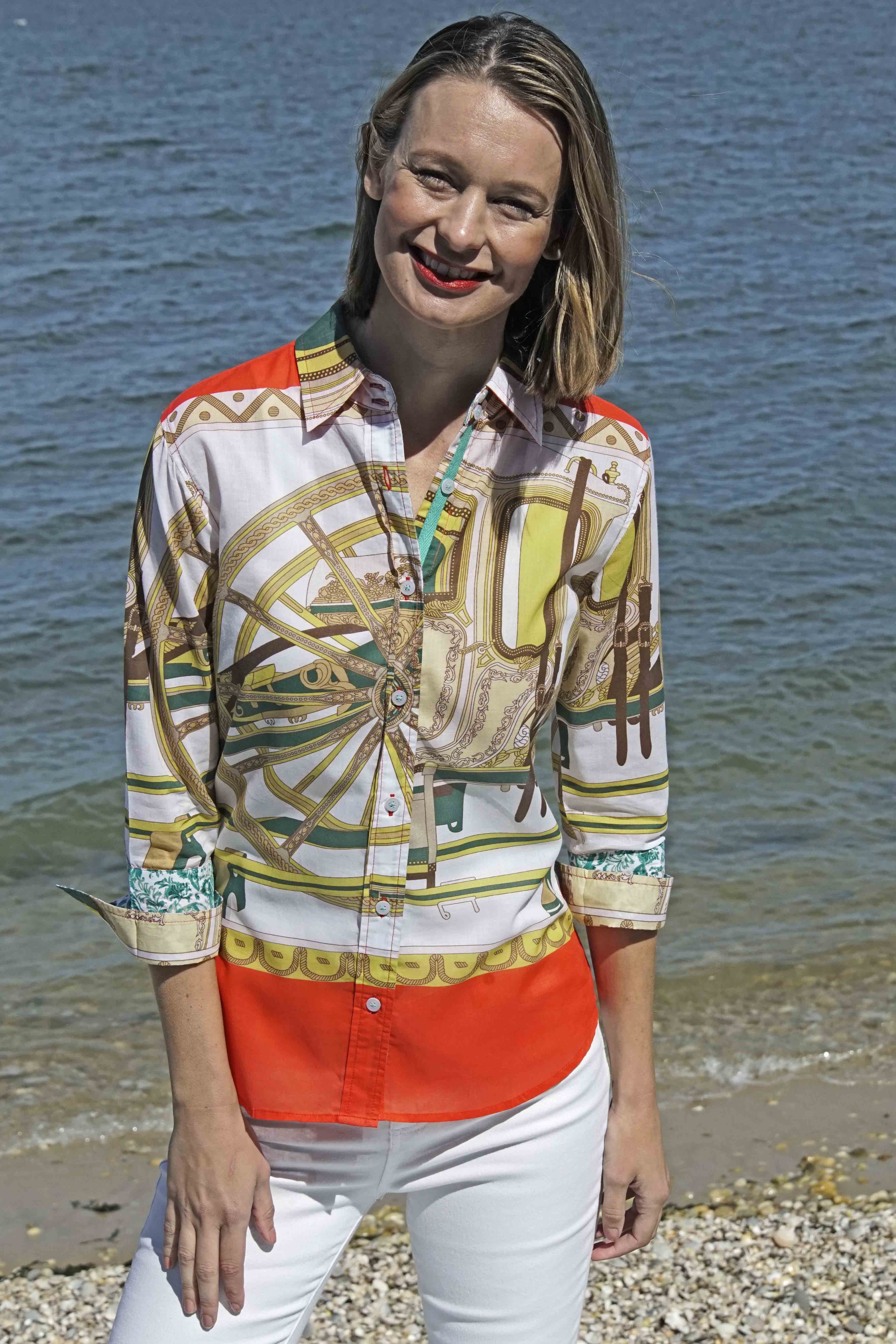 Dizzy-Lizzie 3/4 sleeve shirt with melon and chartreuse wagon wheel print, featuring a stylish, casual design.
