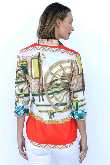 Dizzy-Lizzie 3/4 sleeve shirt featuring a melon and chartreuse wagon wheel print on soft fabric.
