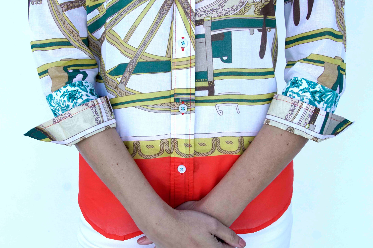 Dizzy-Lizzie 3/4 sleeve shirt with melon and chartreuse wagon wheel print, lightweight casual top for spring and summer styles.