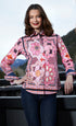 Pink and black maze print Dizzy-Lizzie Rome Shirt displayed on a hanger, showcasing its vibrant design and stylish fit.
