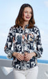 Dizzy-Lizzie Cape Cod Fringe Details Audrey Print shirt with fringe accents and floral pattern on lightweight fabric.