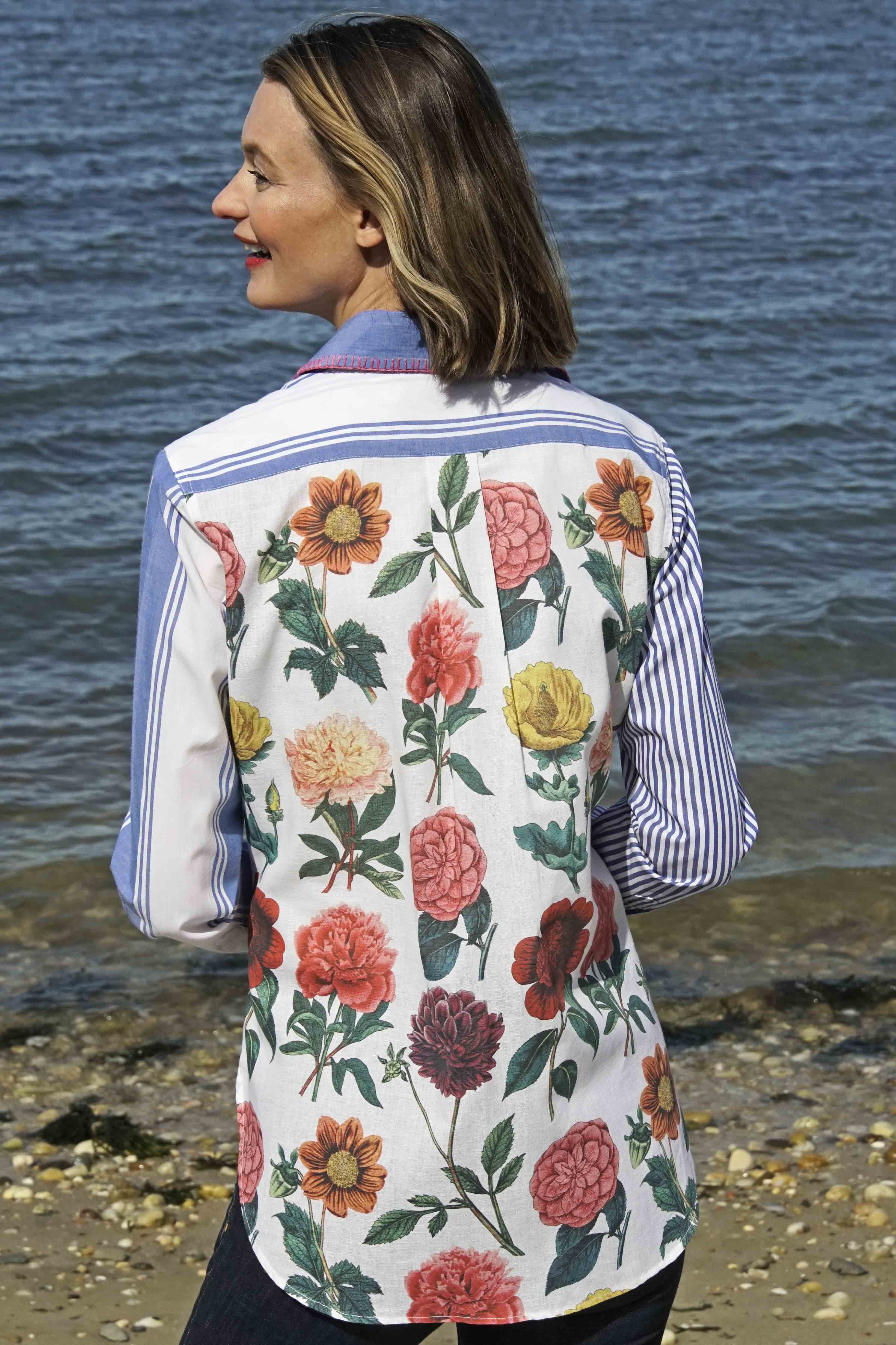 Dizzy-Lizzie Madison top shirt with colorful stripes and floral pattern, featuring whipstitch detail at collar.