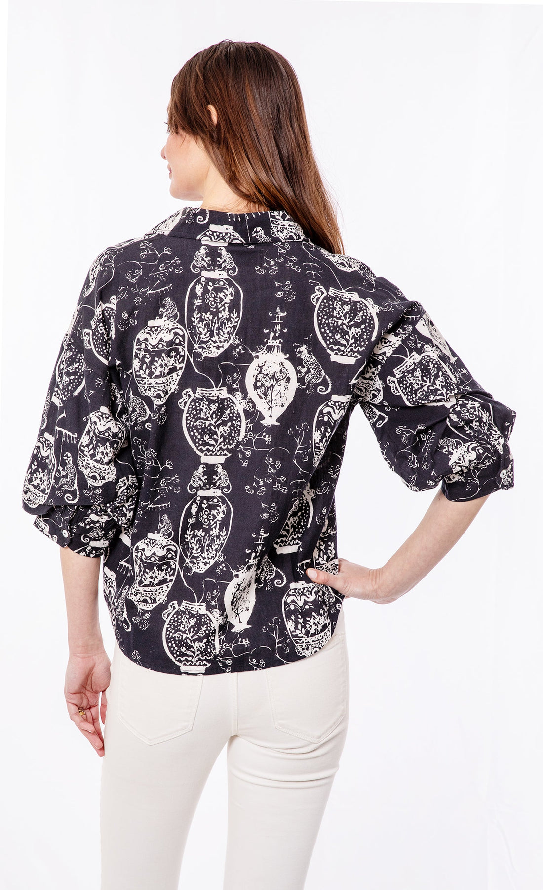 Dizzy-Lizzie oversized black and white puff sleeve shirt, front view showcasing relaxed fit and stylish sleeve design.