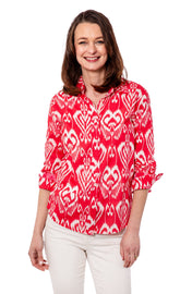 Dizzy-Lizzie Rome shirt with 3/4 sleeves, pink and white ikat pattern, casual women’s blouse with stylish design.