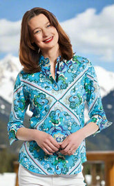 Dizzy-Lizzie Rome shirt with 3/4 sleeves and 70s print featuring vibrant colorful patterns on lightweight fabric.