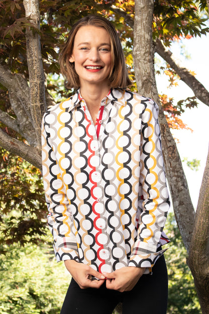 Dizzy-Lizzie Rome Shirt in fall colors with Olympic ring print, featuring a stylish and vibrant casual shirt design.