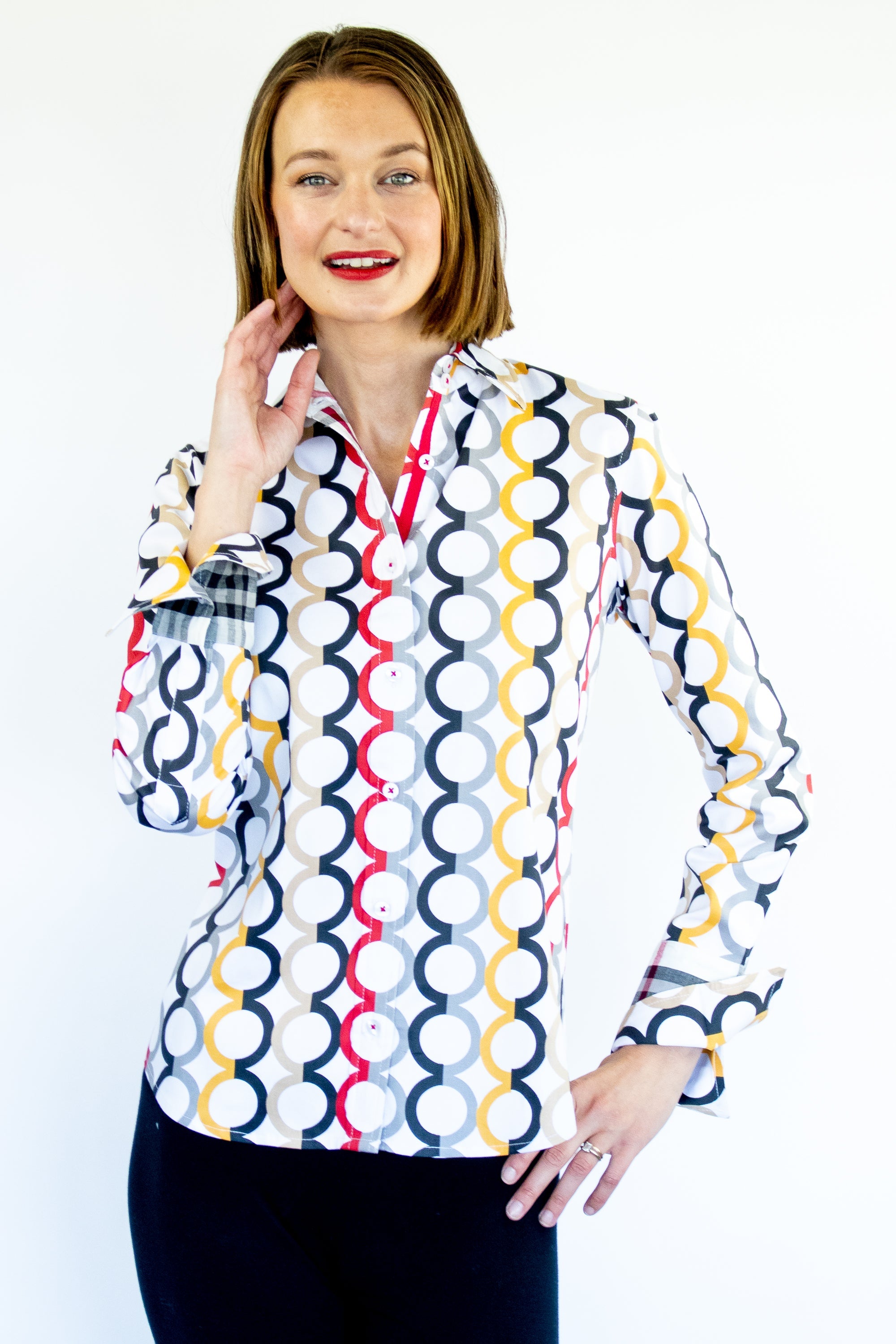 Dizzy-Lizzie Rome Shirt in fall colors with Olympic ring print, featuring vibrant autumn-inspired design and casual fit.