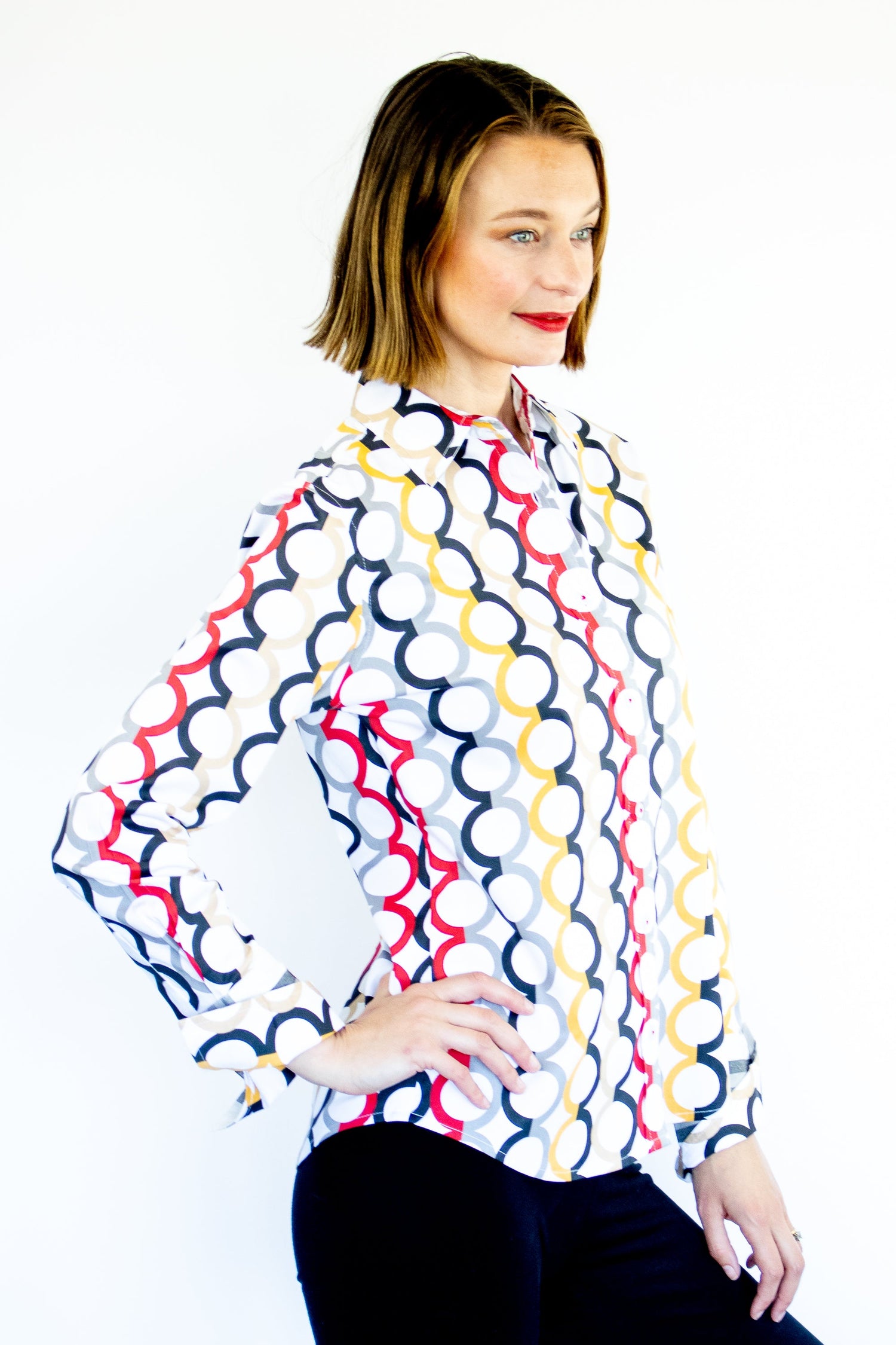Dizzy-Lizzie Rome Shirt in fall colors with Olympic ring print, featuring a casual button-up design and vibrant autumn-inspired pattern.