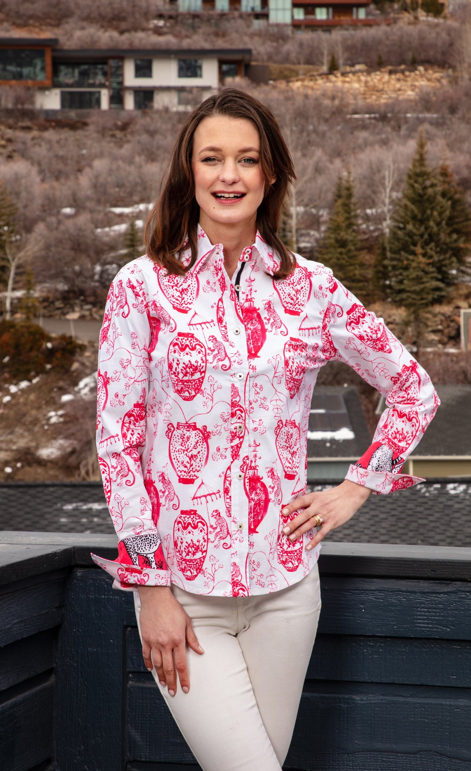 Pink and white Rome shirt by Dizzy-Lizzie featuring a stylish chin detail, displayed on a hanger against a neutral background.