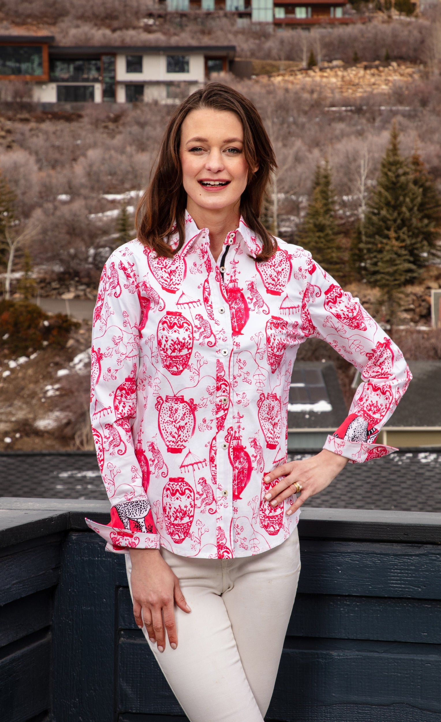 Pink and white Rome shirt by Dizzy-Lizzie featuring a stylish chin detail, displayed on a hanger against a neutral background.