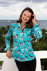 Turquoise Dizzy-Lizzie Rome shirt with black and white poodle pattern, casual short-sleeve design, made for a stylish look.