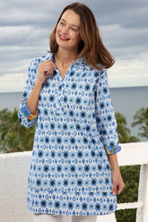 Blue Vail Tunic shirt by Dizzy-Lizzie featuring a vibrant Ikat print and relaxed fit, displayed on a plain background.