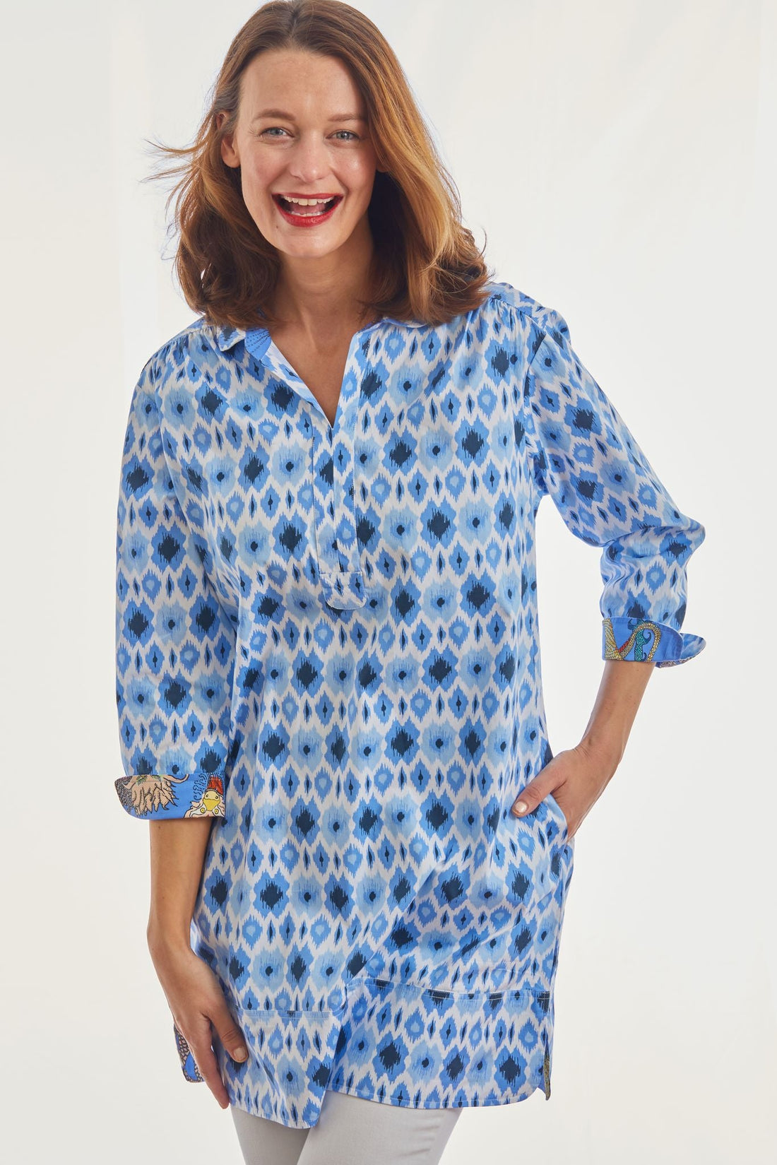 Blue Ikat print Vail Tunic shirt by Dizzy-Lizzie, featuring a relaxed fit and vibrant pattern.