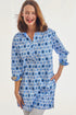 Blue Vail Tunic shirt with Ikat print by Dizzy-Lizzie, featuring a relaxed fit and vibrant pattern, shown front view.
