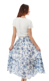 Dizzy-Lizzie Woodstock blue and white skirt with a flowing design, XS size, featuring bold, colorful patterns.