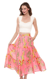 Coral-colored Dizzy-Lizzie Dragon Skirt in XS with detailed dragon pattern and flowing fabric, perfect for stylish casual wear.