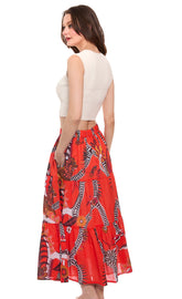 Orange abstract skirt by Dizzy-Lizzie featuring a vibrant, eye-catching design and flowing fabric, perfect for casual or stylish wear.