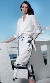 Dizzy-Lizzie whale print sarong skirt in lightweight fabric, featuring a vibrant whale pattern perfect for beach or casual wear.