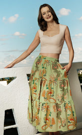 Green Woodstock Skirt by Dizzy-Lizzie in 100% cotton voile with a colorful dragon print, lightweight and breathable for warm weather.