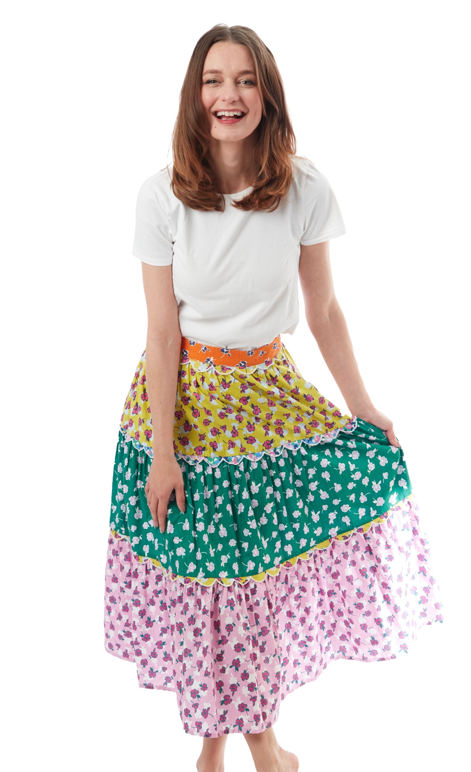 Dizzy-Lizzie Woodstock skirt with intricate embroidery, featuring a flowy design and vibrant floral patterns.