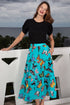 Dizzy-Lizzie Woodstock turquoise butterfly pull-on flounce skirt with elastic waistband and ruffled hem, stylish and comfortable for warm weather.