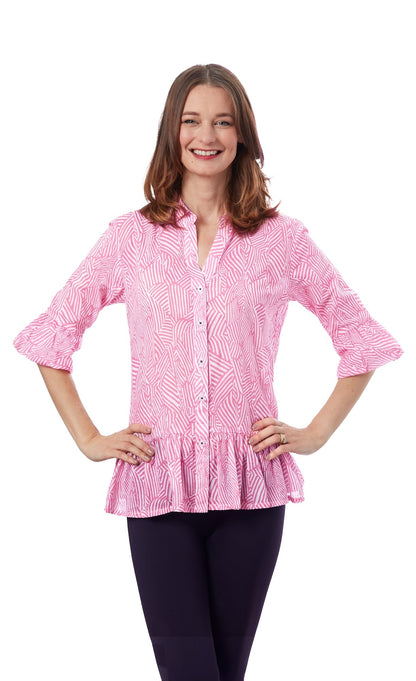 Pink and white peplum top from Dizzy-Lizzie featuring a fitted silhouette and stylish design, perfect for casual or dressy occasions.