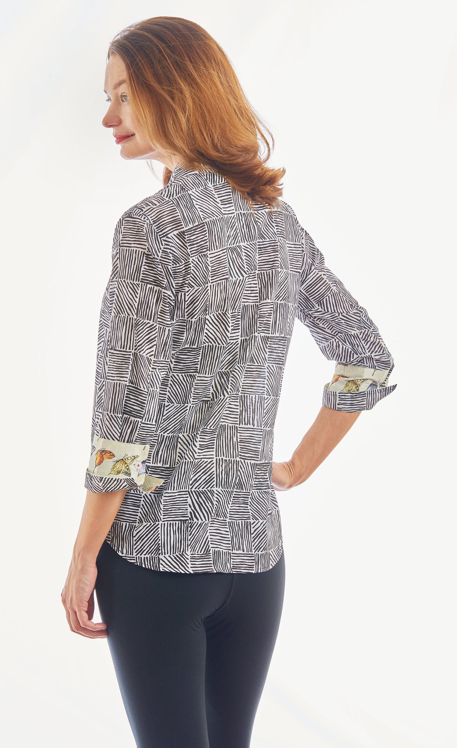 Dizzy-Lizzie 3/4 sleeve Rome black and white criss-cross boxes top, featuring a stylish casual design with contrasting patterns.