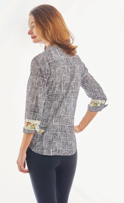 Dizzy-Lizzie 3/4 sleeve Rome black and white criss-cross boxes top, featuring a stylish casual design with contrasting patterns.