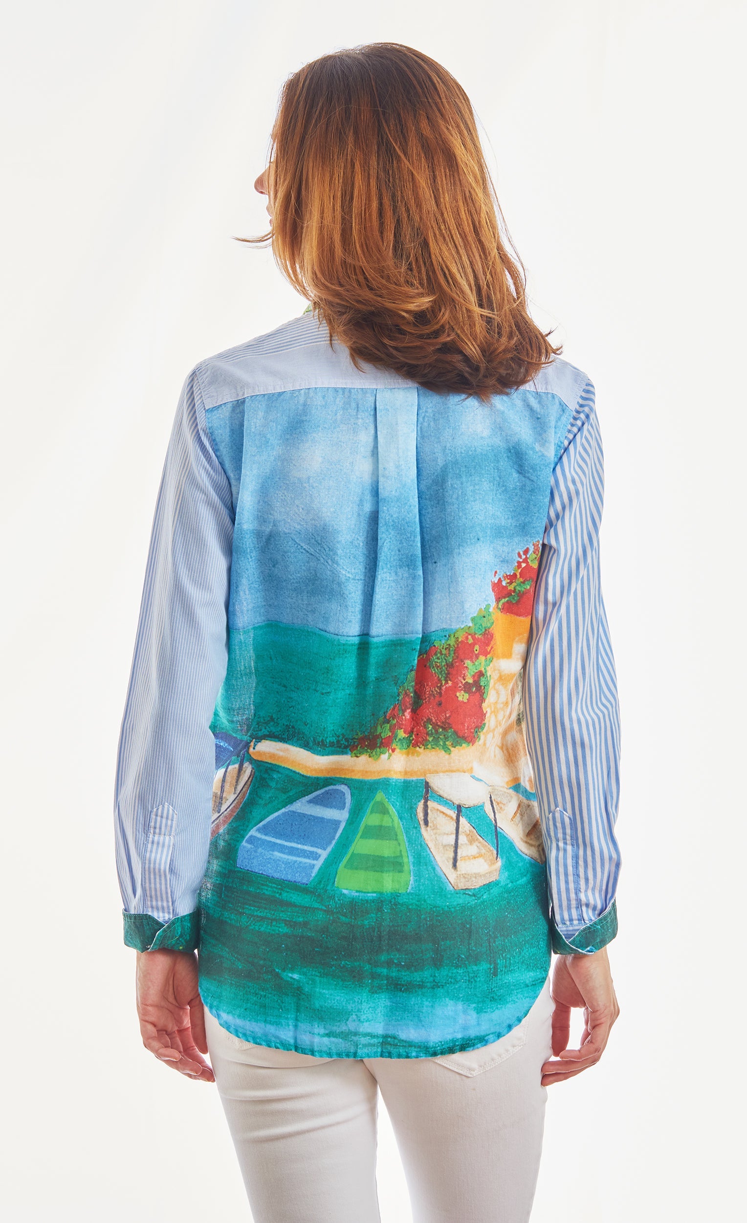 Dizzy-Lizzie Chesapeake top in blue and white stripes featuring a Positano scene on the back, stylish casual fashion top.