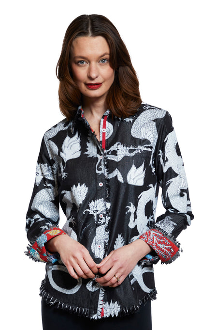 Black denim Cape Cod tunic by Dizzy-Lizzie featuring white dragon embroidery, showcasing a stylish top with detailed design.
