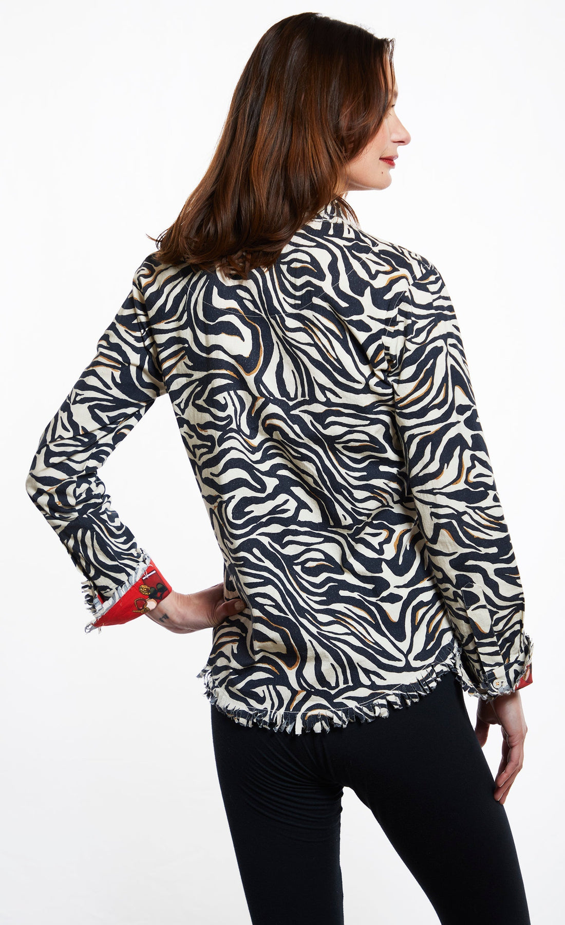 Dizzy-Lizzie Cape Cod black and white zebra print top, showcasing stylish animal print design and fitted silhouette.
