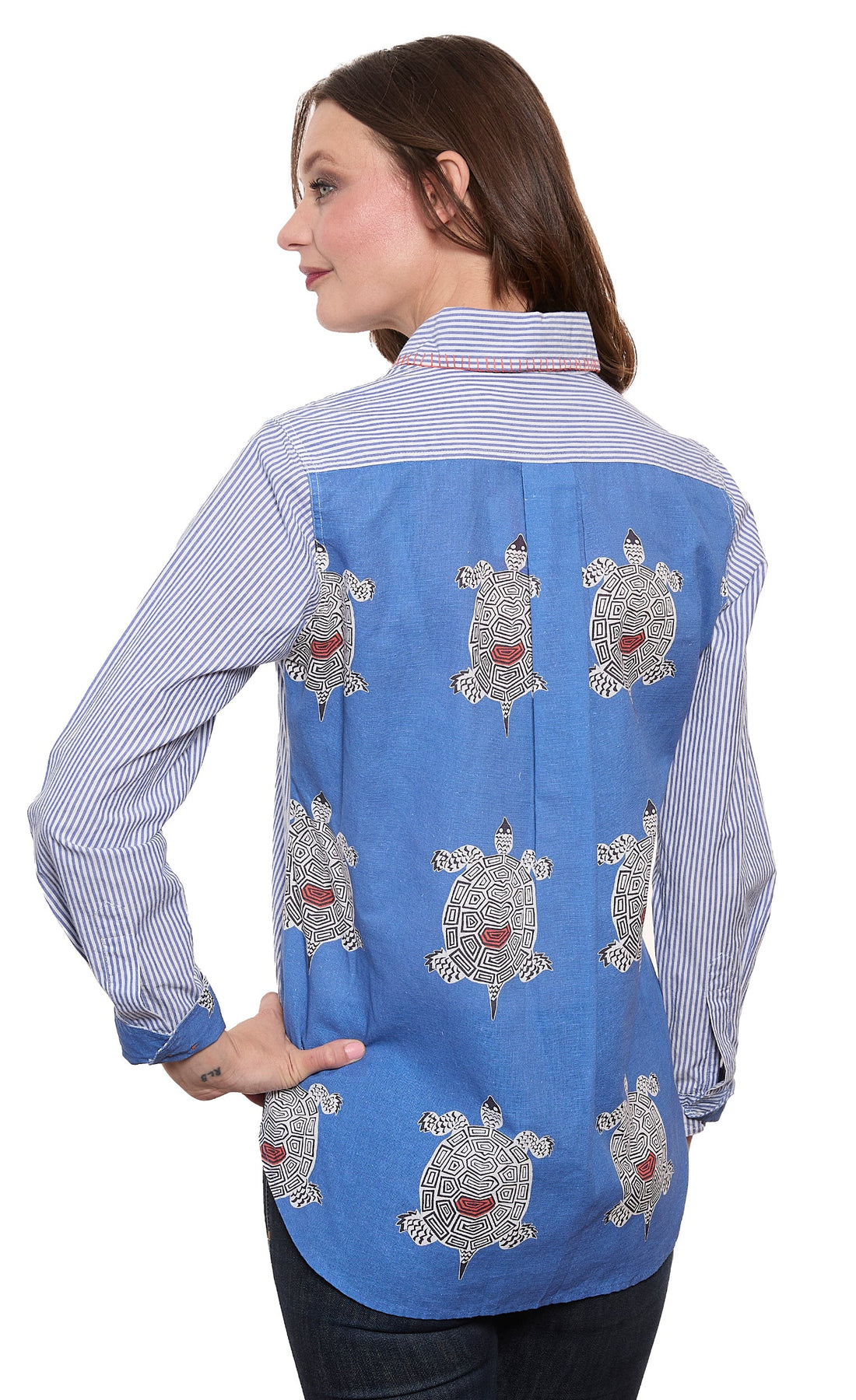 Dizzy-Lizzie Chesapeake top featuring a turtle-back panel design, short-sleeve blouse in a casual, stylish fit.