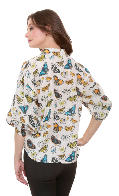 Dizzy-Lizzie Milano puff sleeve top with butterfly print cotton voile fabric in ivory, featuring ruffled sleeves and a relaxed fit.