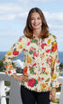 Dizzy-Lizzie Cape Cod Tunic with botanical print, lightweight fabric, and relaxed fit, displayed on a hanger.