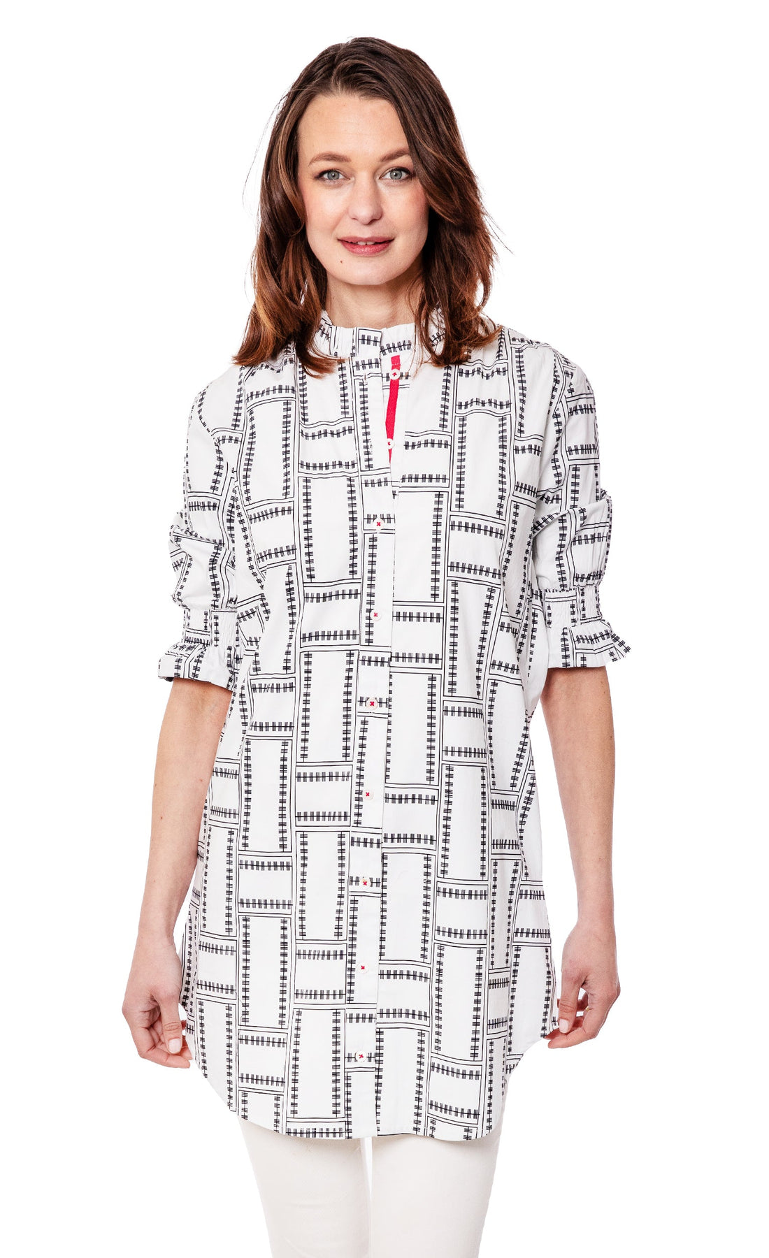 White geo print big tunic with ruffle sleeves by Dizzy-Lizzie, featuring a loose fit and stylish design.