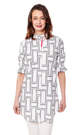 White geo print big shirt tunic with ruffle sleeves by Dizzy-Lizzie, featuring a loose fit and stylish design.